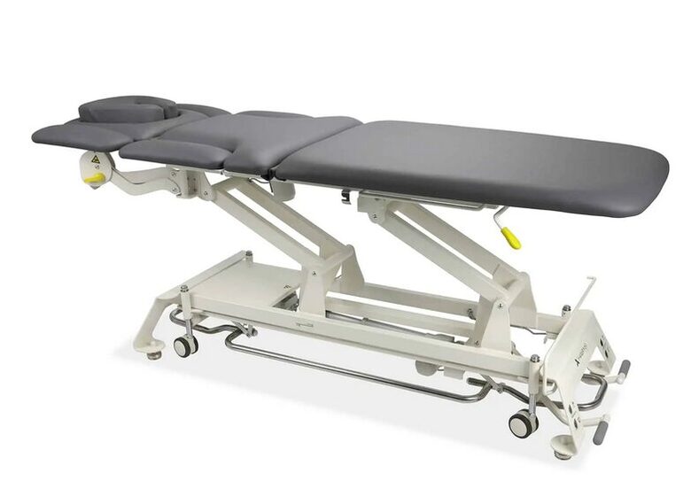 7 segmentu ārstēšanas galds procedūrām un medicīniskām pārbaudēm, diagnostikas procedūrām, masāžai, rehabilitācijai un manuālajai terapijai. ELEKTRISKS. Pelēkā krāsā. Maksimālā pieļaujamā slodze: 200 kg. Medicīnas ierīce