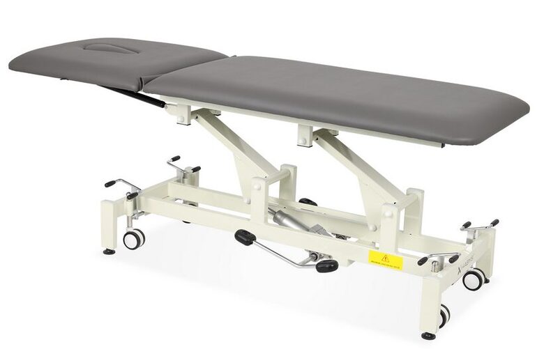 2 segmentu ārstēšanas galds procedūrām un medicīniskām pārbaudēm, diagnostikas procedūrām, masāžai, rehabilitācijai un manuālajai terapijai. HIDRAULISKS. Pelēkā krāsā. Maksimālā pieļaujamā slodze: 230 kg. Medicīnas ierīce