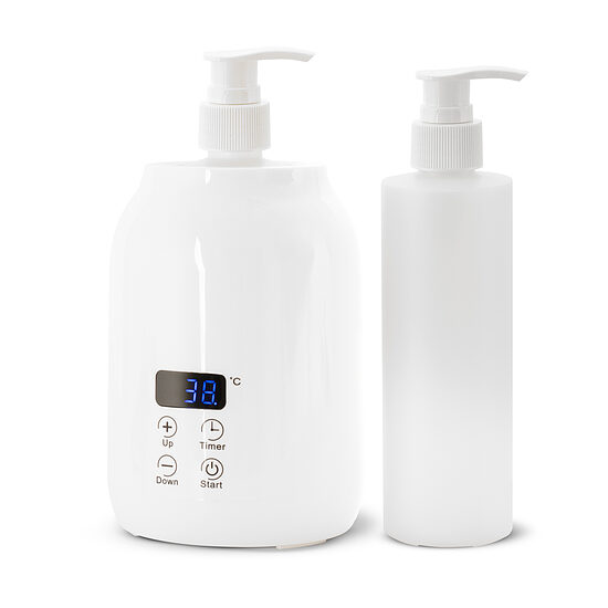 Eļļu, losjonu un ķermeņa pieniņu sildītājs ar divām 250 ml pudelēm. Skārienvadības panelis un LED displejs. Temperatūru iespējams regulēt 30–65 °C diapazonā